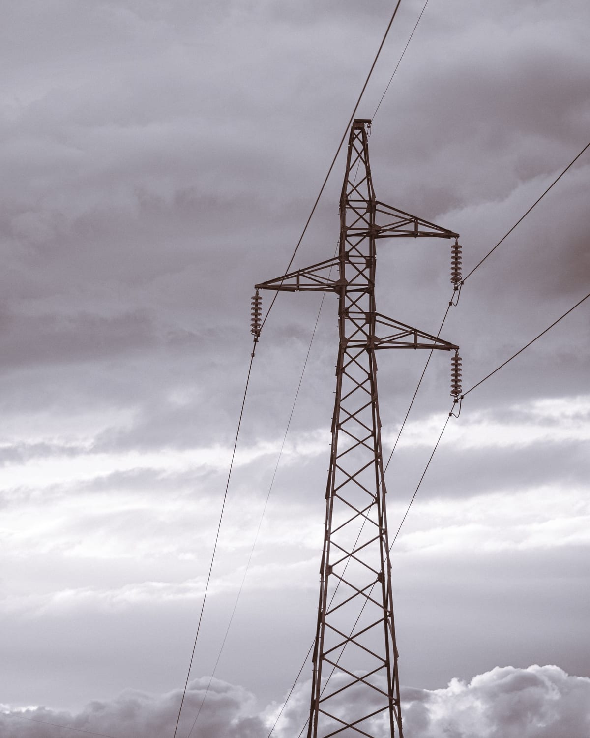 Transmission pylon against a dramatic sky